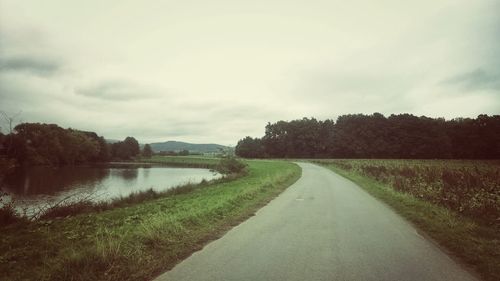 Road passing through lake