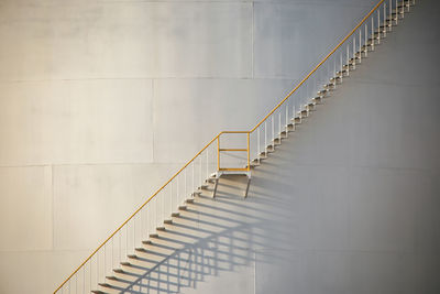 Low angle view of staircase on wall