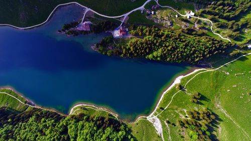 Panoramic view of green landscape against sky