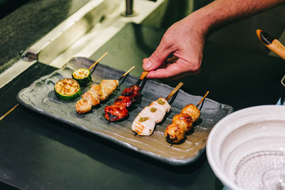 High angle view of sushi on barbecue grill