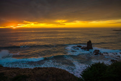 Scenic view of sea against sky during sunset