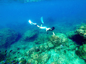 Man swimming in sea