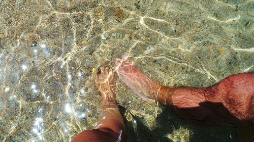 Low section of woman on beach