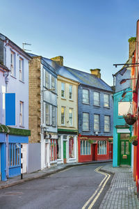 Street with bright colored houses in kinsale, ireland