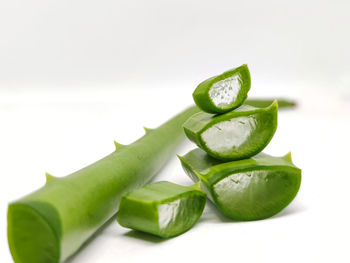 Close-up of chopped fruit against white background