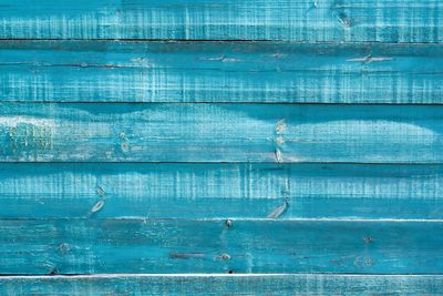 Full frame shot of blue weathered wood