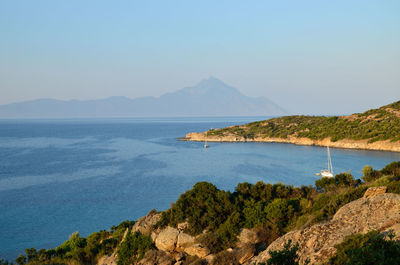 View at bay of aegean sea and athos mountain in greece at the end of the day light