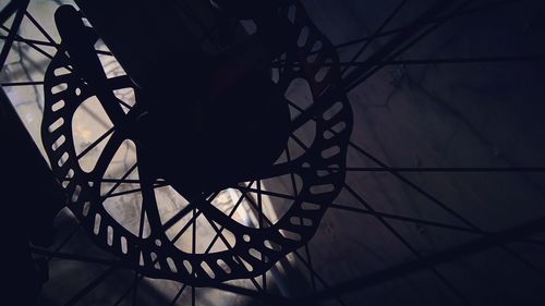 Low section of silhouette person on bicycle
