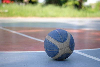 Close-up of soccer ball on field