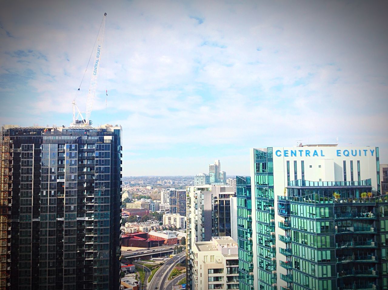 building exterior, architecture, built structure, city, sky, residential building, cityscape, cloud - sky, building, residential structure, residential district, city life, cloudy, cloud, office building, day, no people, outdoors, modern, low angle view