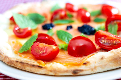 Close-up of pizza served in plate