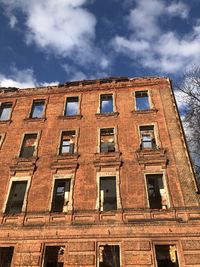 Low angle view of old building against sky