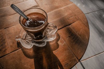 High angle view of coffee cup on table