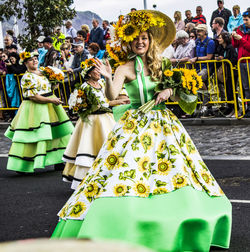 View of people standing by building