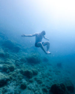 Man swimming in sea