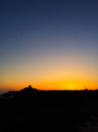 Silhouette of trees at sunset