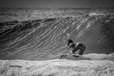 Man surfing in sea