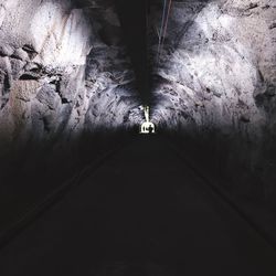 Rear view of man in tunnel