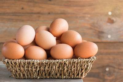 Close-up of eggs in container on table