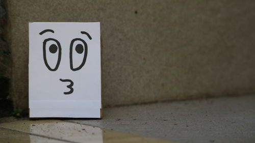 Close-up of text on wall