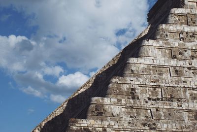 Low angle view of old ruins against sky