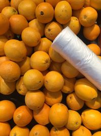 Full frame shot of oranges at market stall