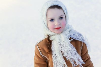 Portrait of cute girl in snow