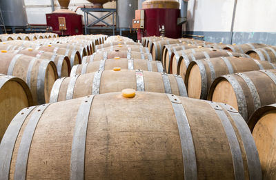 Close-up of wine bottles in row