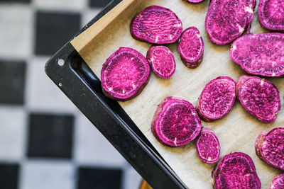 Close-up of chopped sweet potato on cutting board 