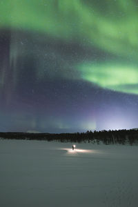 Scenic view of sea against sky at night