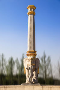 Statue of holy elephant against clear sky