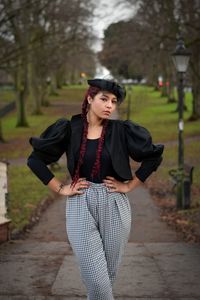 Portrait of beautiful woman standing outdoors