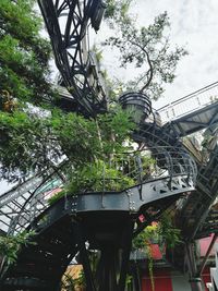 Low angle view of railroad bridge against sky