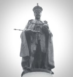 Low angle view of statue against sky