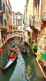 Boats moored in canal