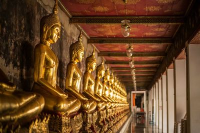 Golden buddha statues in wat suthat temple