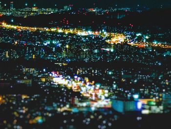 High angle view of illuminated buildings at night