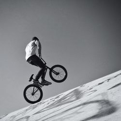 Full length of a young man skateboarding