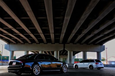 Car parked under bridge