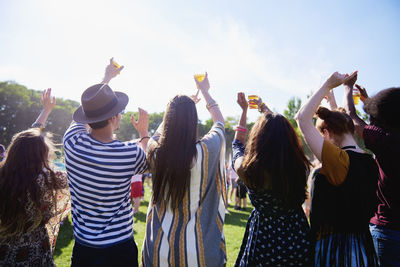 Group of people at party during sunny day