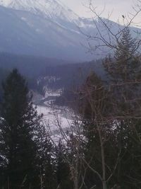 Scenic view of lake with mountains in background