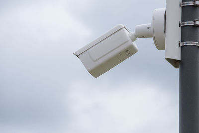 Surveillance camera in the area, street security, face recognition. security system