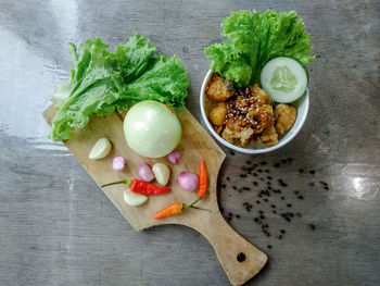 High angle view of vegetables on cutting board