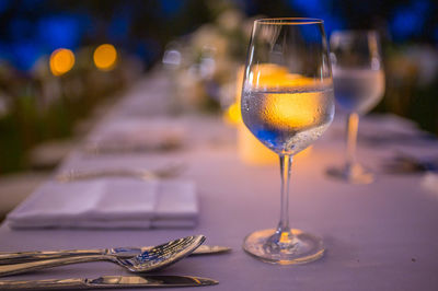 Close-up of wine in glass on table at restaurant