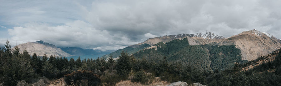 Panoramic view of queenstown hills and lake pukaki.