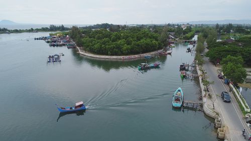 High angle view of people on river against sky