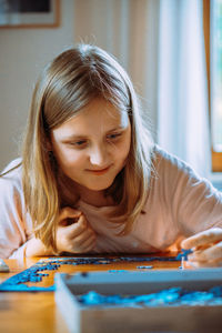 Portrait of a smiling girl at home