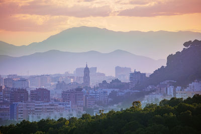 High angle view of townscape against sky during sunset