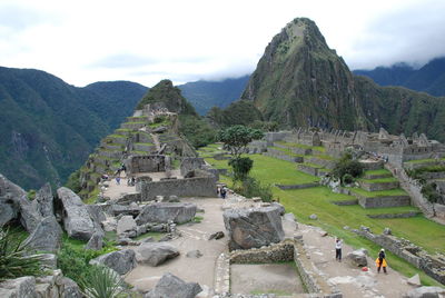 High angle view of rocks at machu picchu in foggy weather