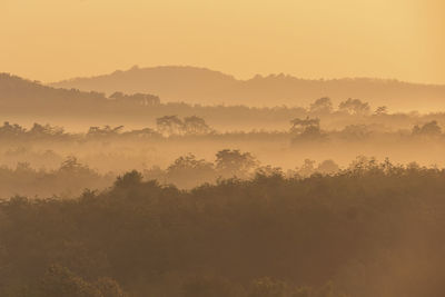 Scenic view of landscape against sky during sunset